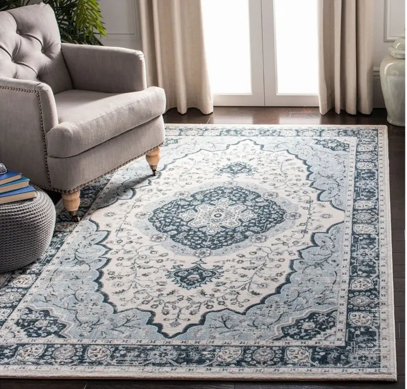 Isabella Area Rug in Cream/Light Blue by Safavieh