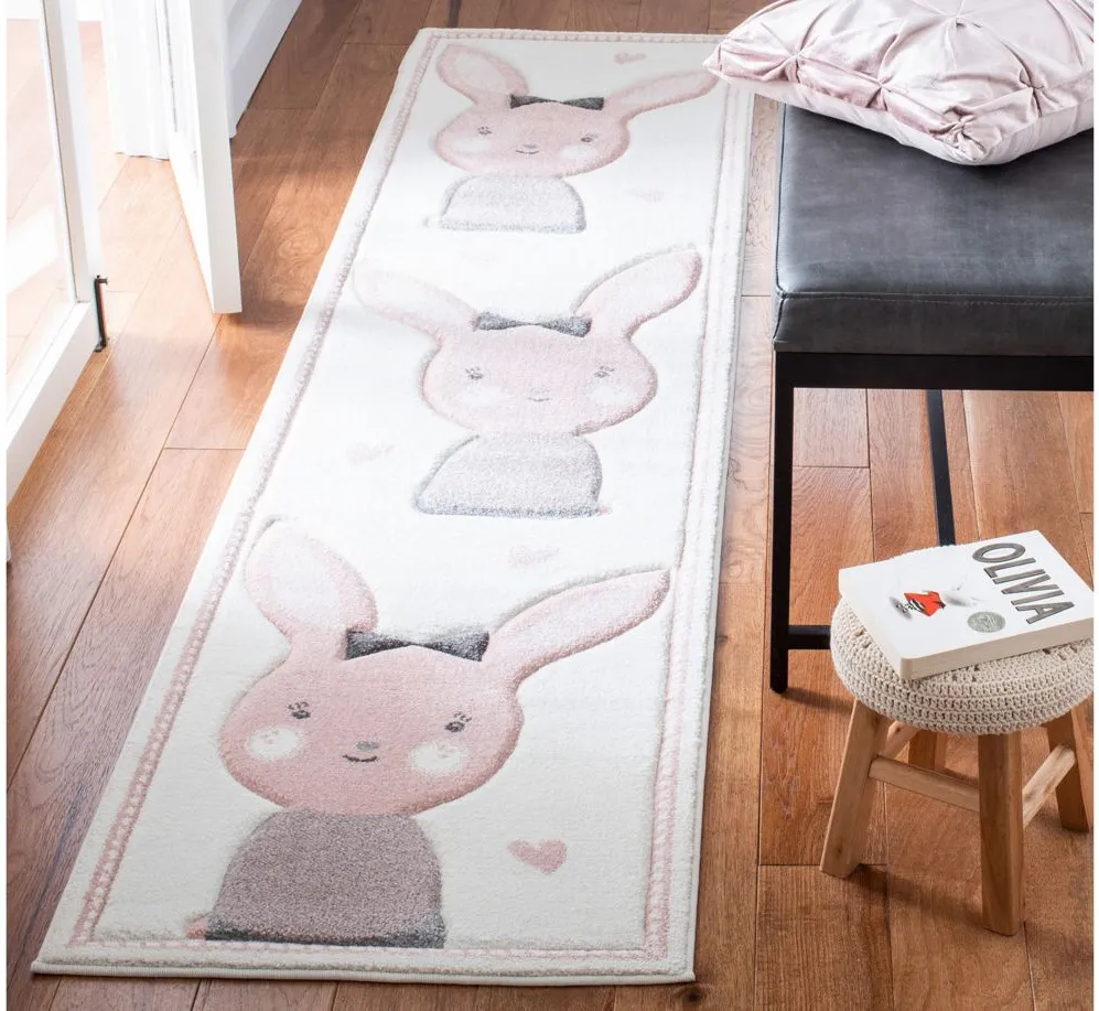 Carousel Bunny Kids Runner Rug in Ivory & Pink by Safavieh