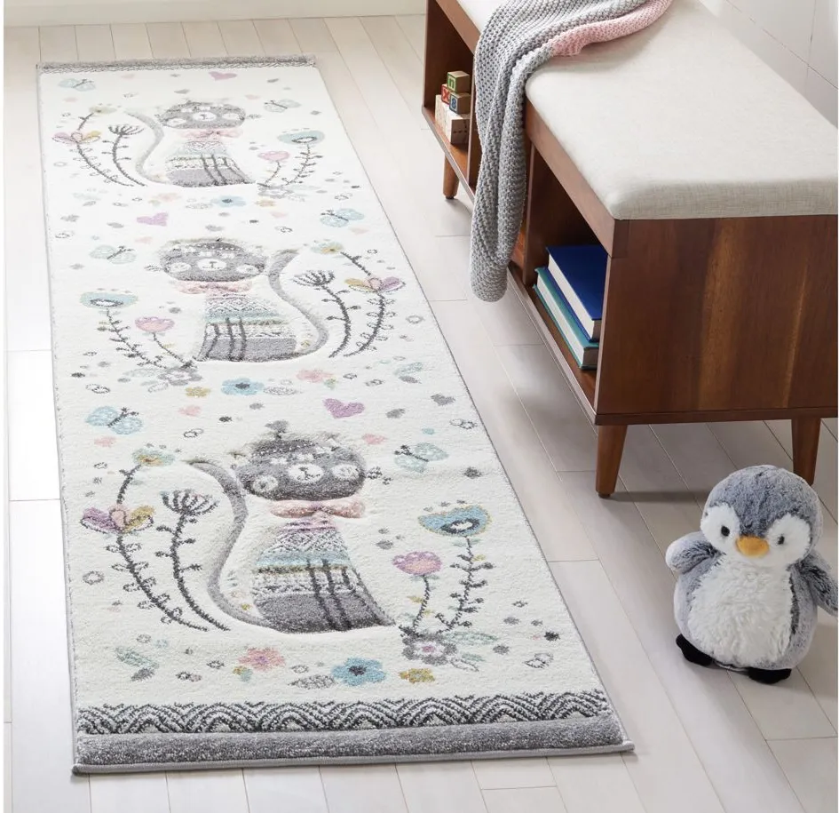 Carousel Cat Kids Runner Rug in Ivory & Pink by Safavieh