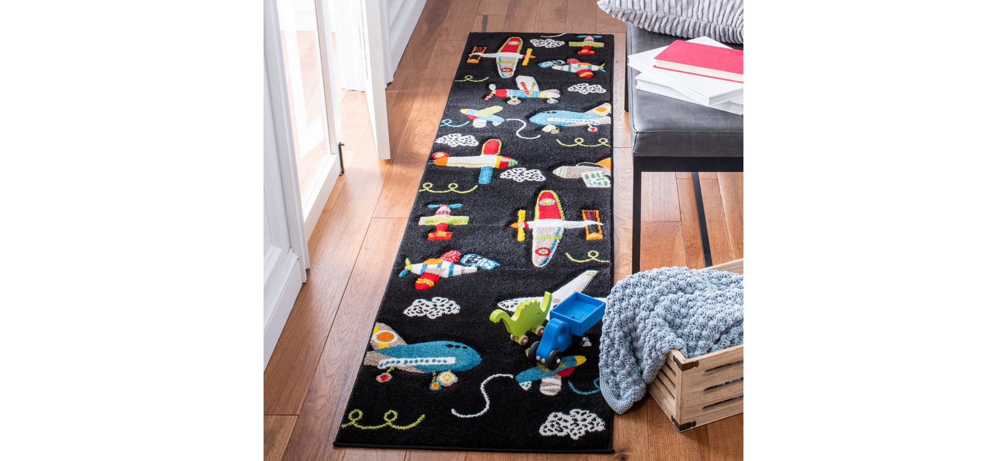 Carousel Planes Kids Runner Rug in Black & Ivory by Safavieh