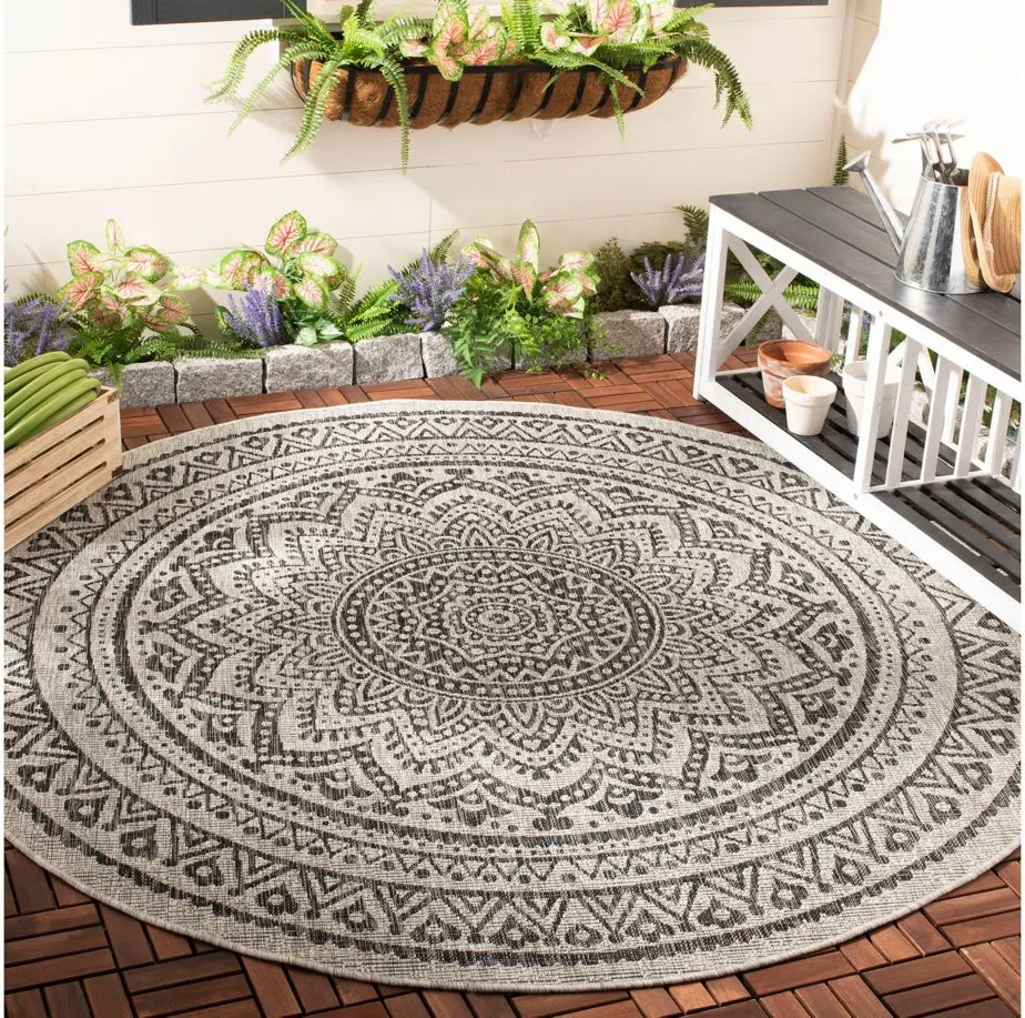 Courtyard Mandala Indoor/Outdoor Area Rug Round in Light Gray & Black by Safavieh