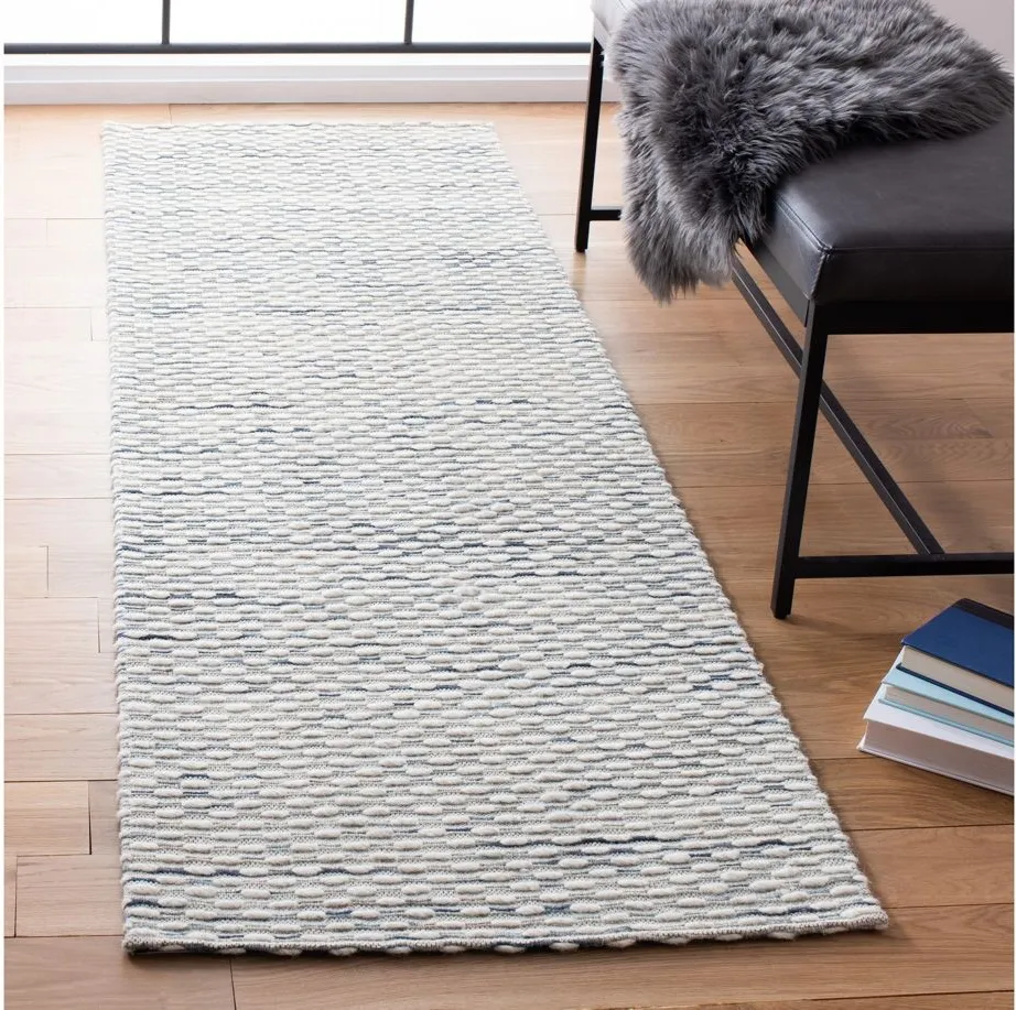 Marbella I Area Rug in White/Navy by Safavieh