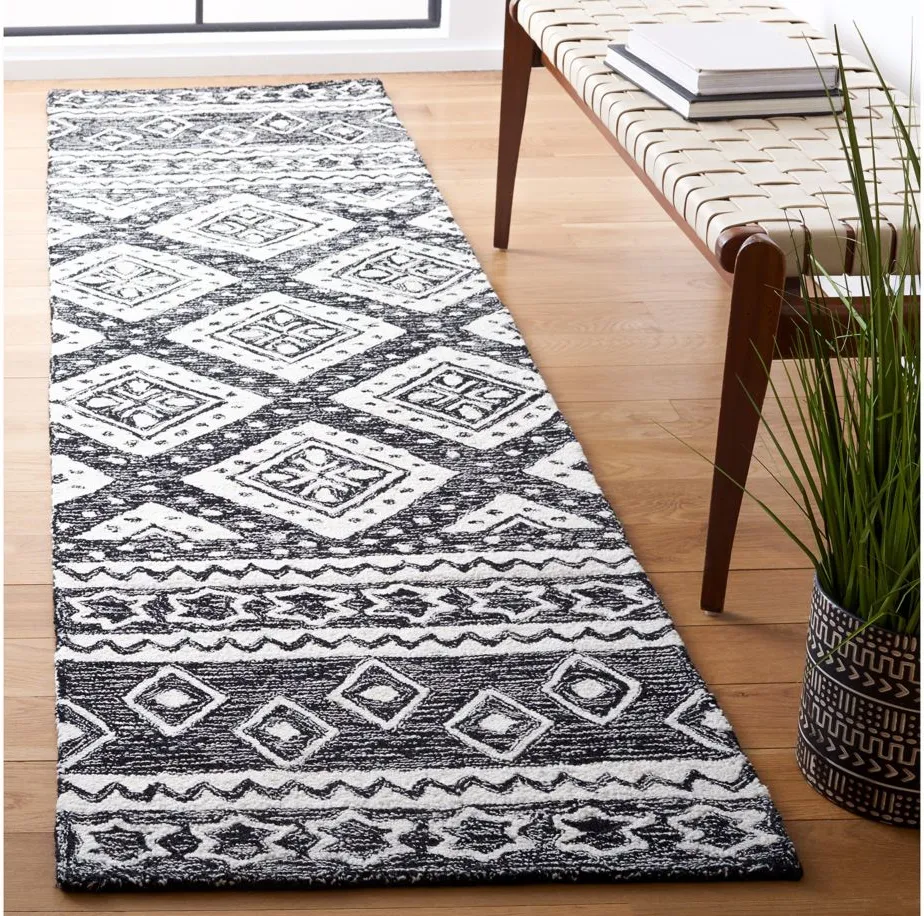 Miyamoto Runner Rug in Black & Ivory by Safavieh