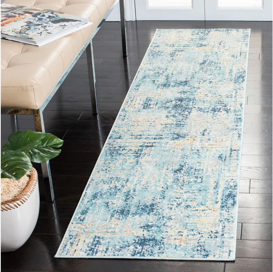 Ammon Area Rug in Ivory / Blue by Safavieh