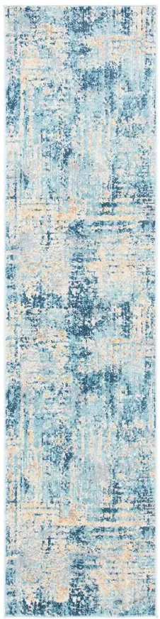 Ammon Area Rug in Ivory / Blue by Safavieh