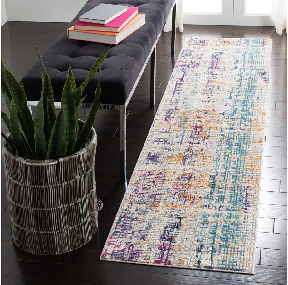 Ahnka Area Rug in Ivory / Turquoise by Safavieh