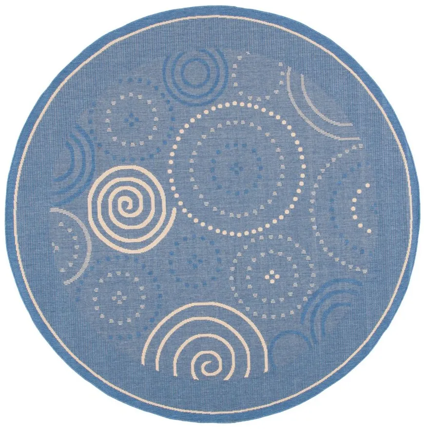 Courtyard Circles Indoor/Outdoor Area Rug Round in Blue & Natural by Safavieh