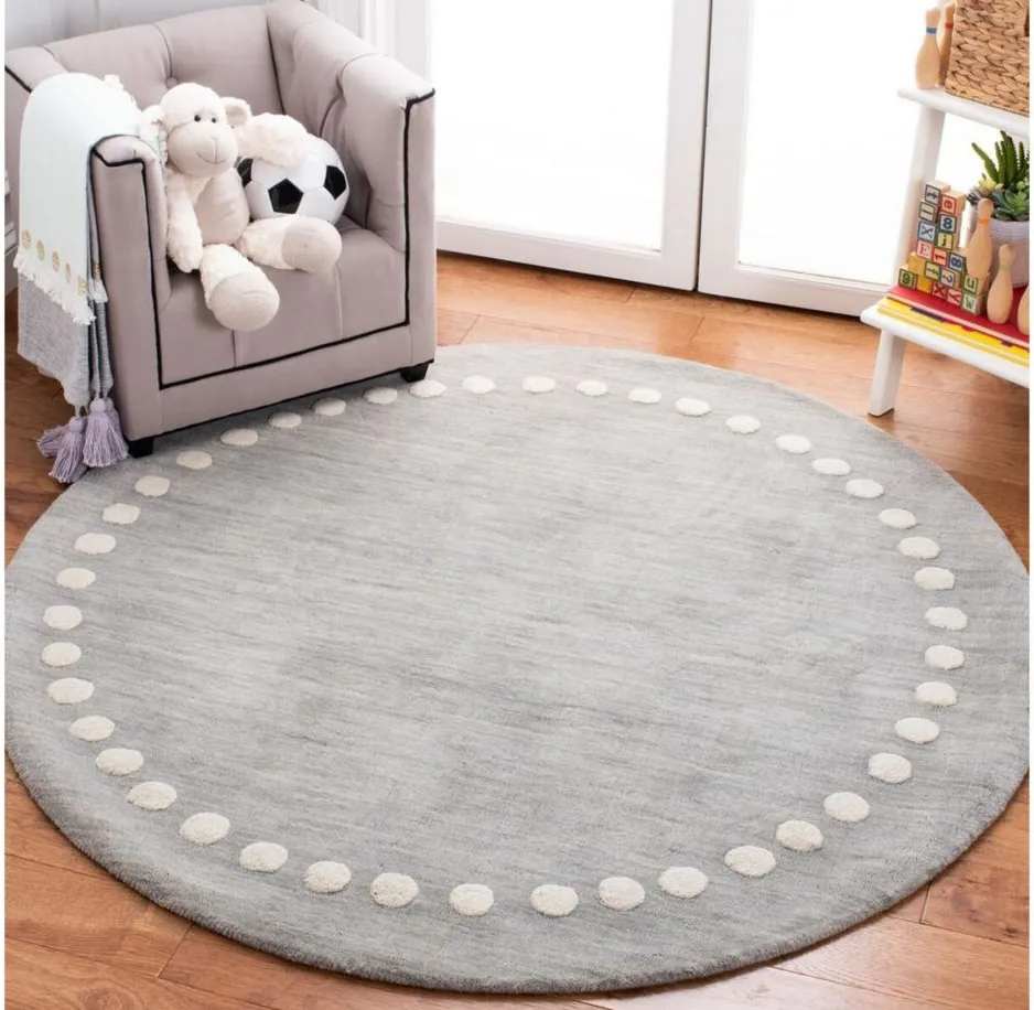 Finnian Kid's Area Rug in Grey by Safavieh