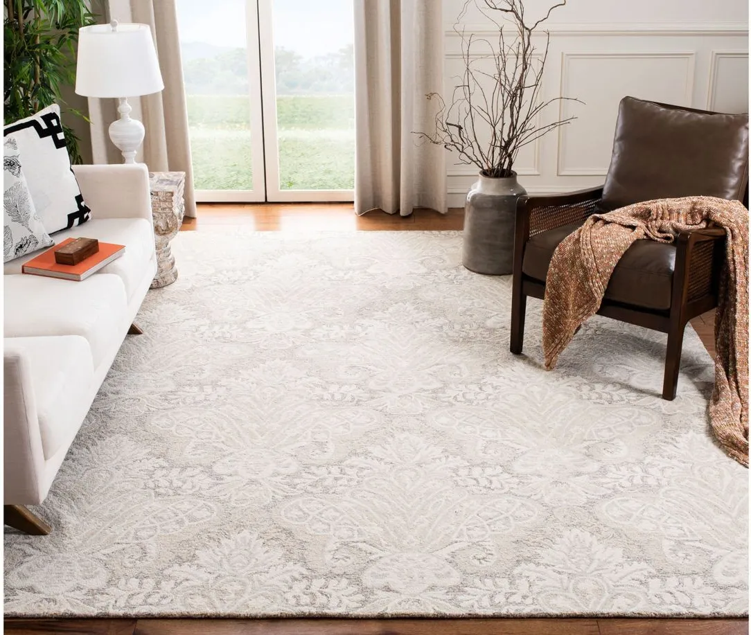 Nyneave Area Rug in Beige by Safavieh