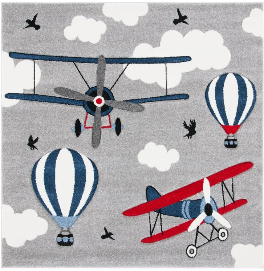 Carousel Airplanes Kids Area Rug in Light Gray & Red by Safavieh