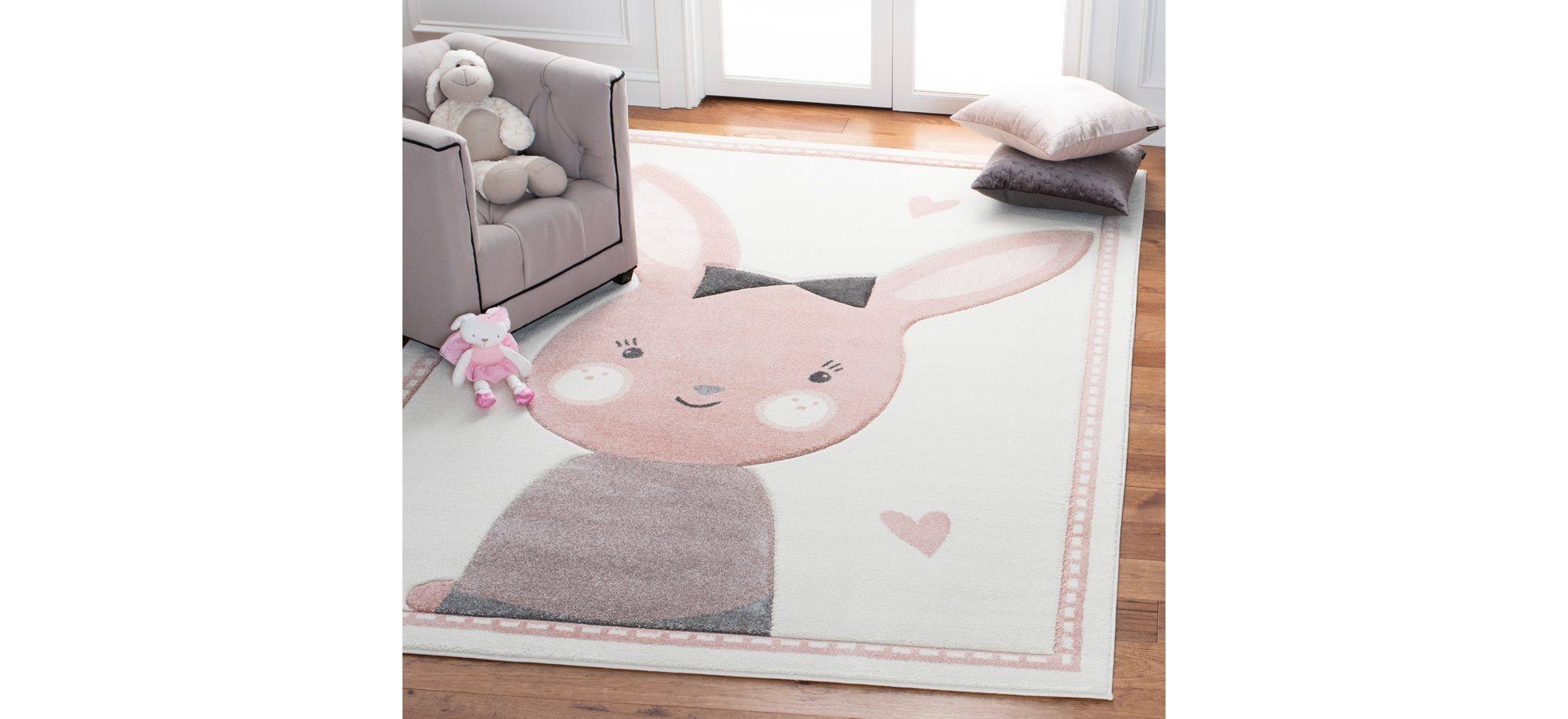 Carousel Bunny Kids Area Rug in Ivory & Pink by Safavieh