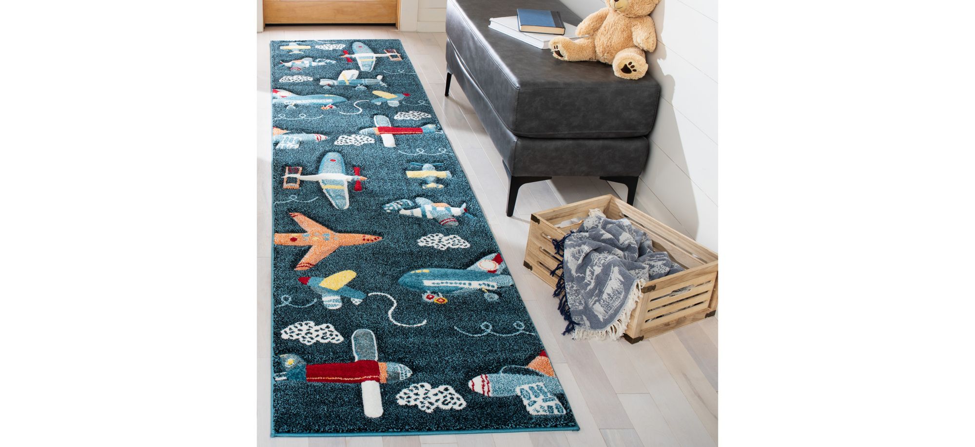 Carousel Planes Kids Area Rug in Navy & Ivory by Safavieh