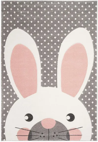 Carousel Rabbit Kids Area Rug in Pink & Gray by Safavieh