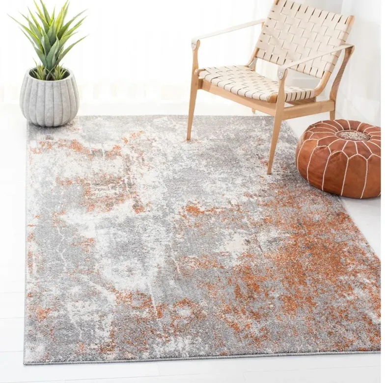 Osbourne Area Rug in Gray & Rust by Safavieh