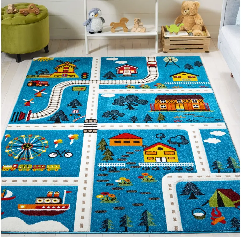 Carousel Town Kids Area Rug in Blue & Beige by Safavieh