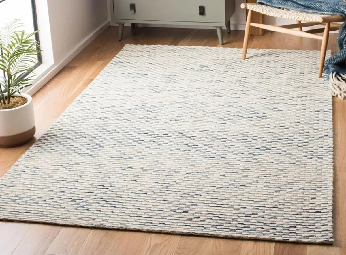 Marbella I Area Rug in White/Navy by Safavieh