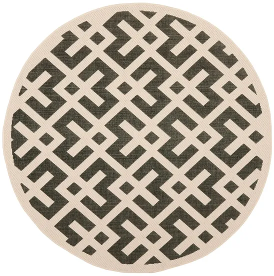 Courtyard Crossing Indoor/Outdoor Area Rug Round in Black & Beige by Safavieh