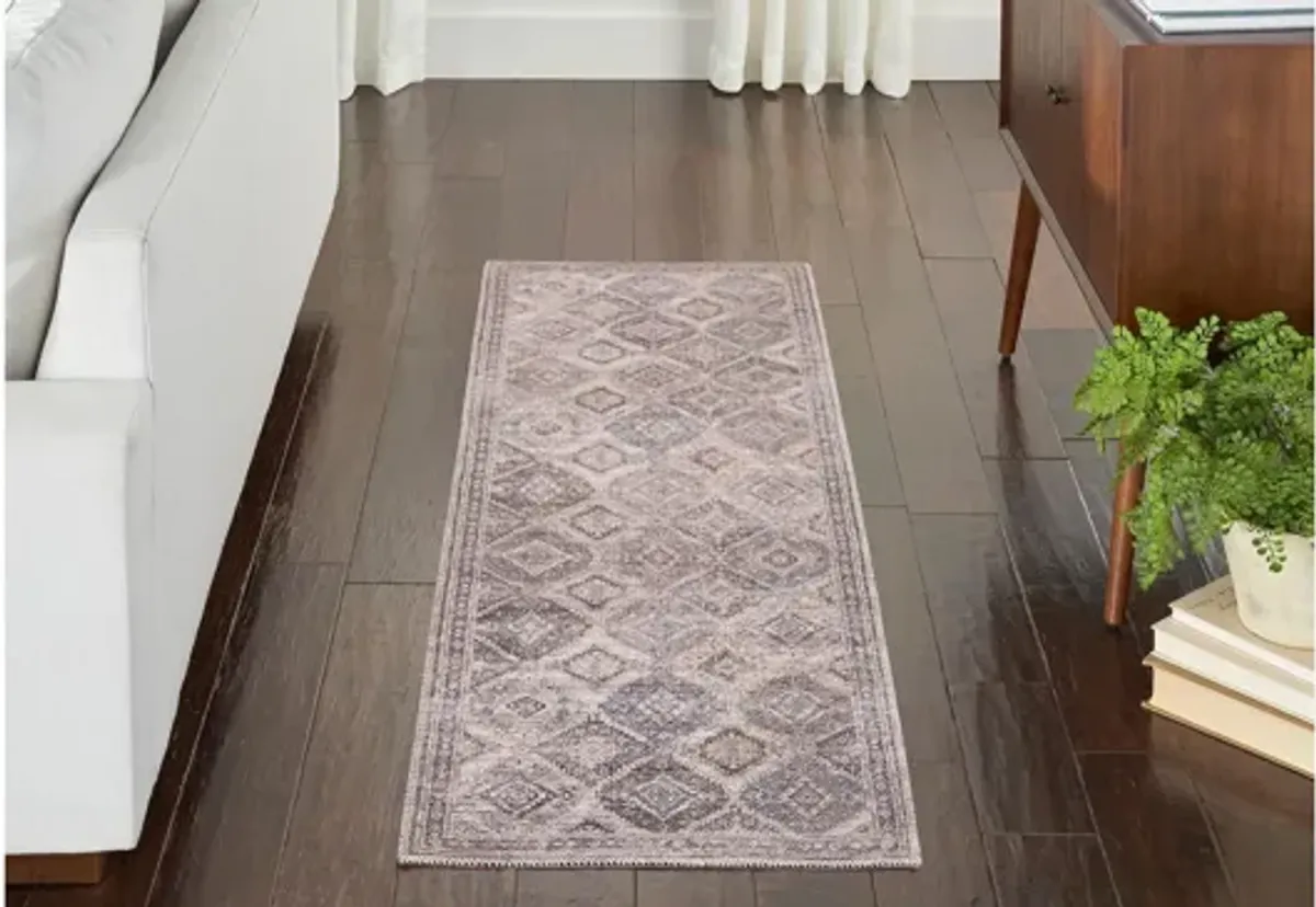 Nicole Curtis Blaiddwyn Area Rug