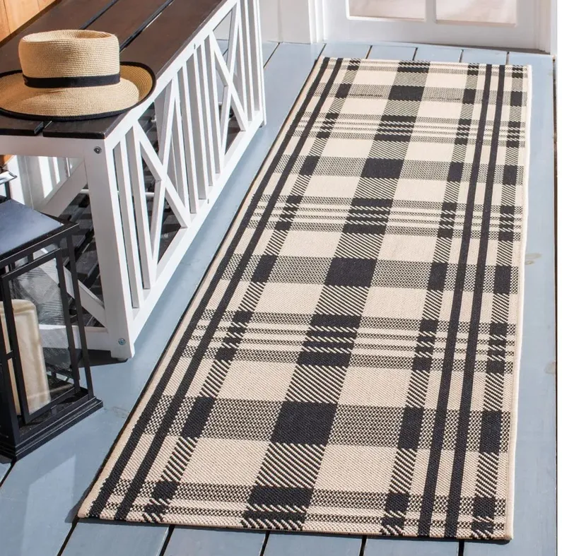 Courtyard Plaid Indoor/Outdoor Runner Rug in Black & Bone by Safavieh