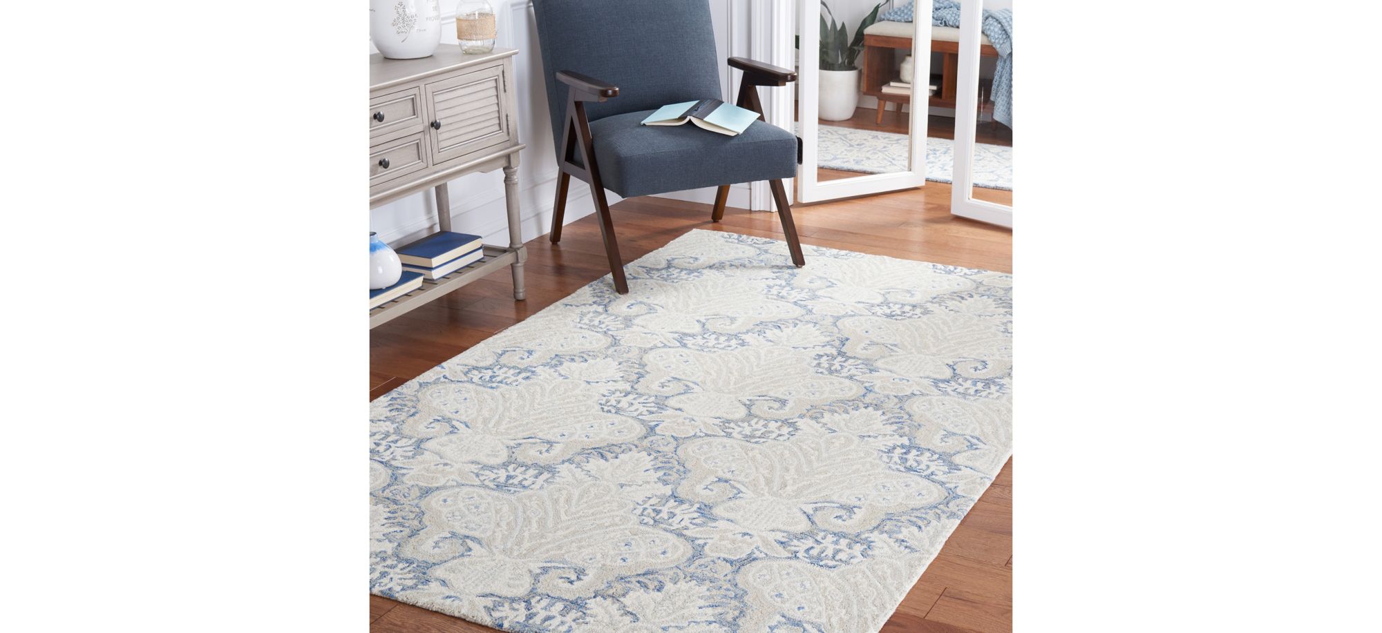 Nyneave Area Rug in Blue & Ivory by Safavieh