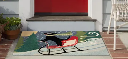 Frontporch Sledding Dog Indoor/Outdoor Area Rug in Multi by Trans-Ocean Import Co Inc