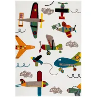 Carousel Planes Kids Area Rug in Ivory & Blue by Safavieh