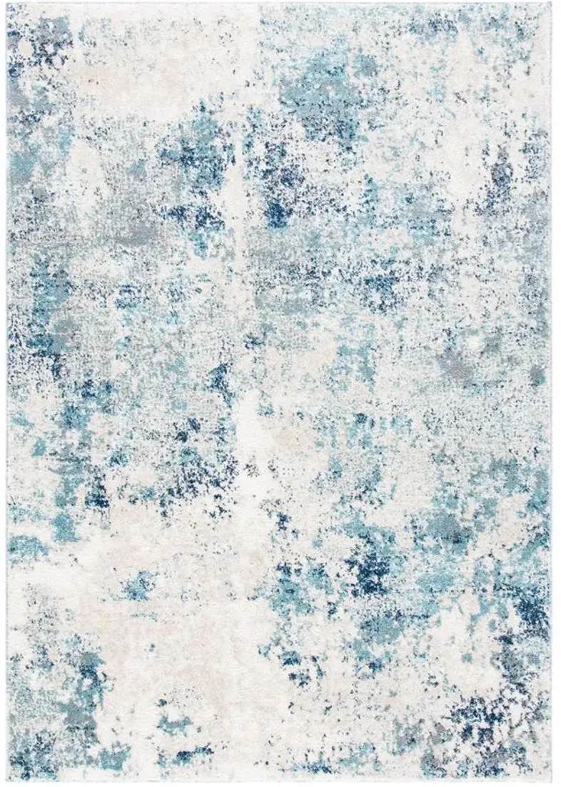 Iommi Area Rug in Ivory & Blue by Safavieh