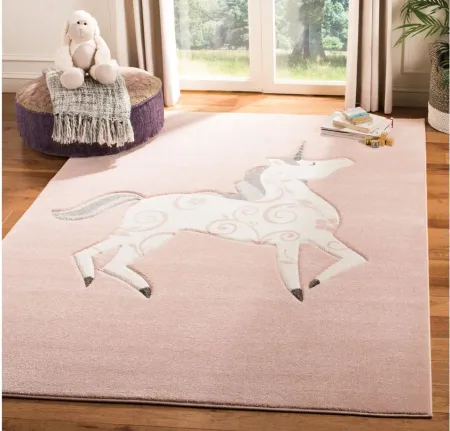 Carousel Unicorn Kids Area Rug in Pink & Ivory by Safavieh