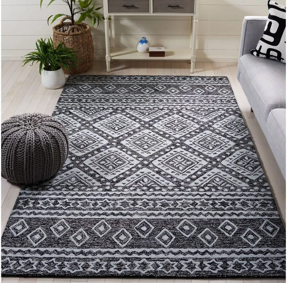 Miyamoto Area Rug in Black & Ivory by Safavieh