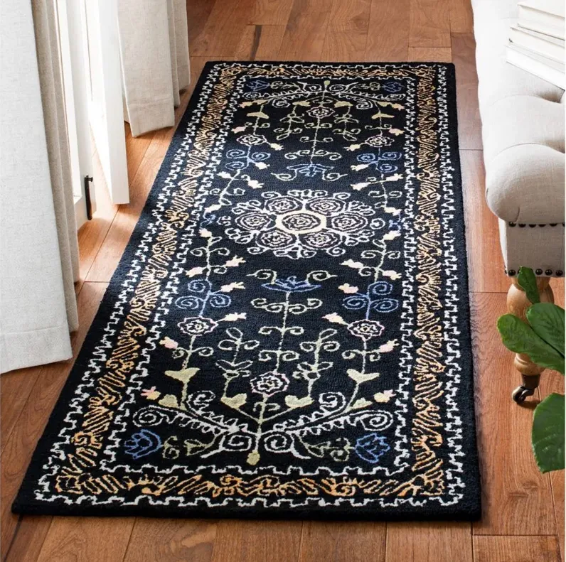 Shakespeare Runner Rug in Black & Green by Safavieh