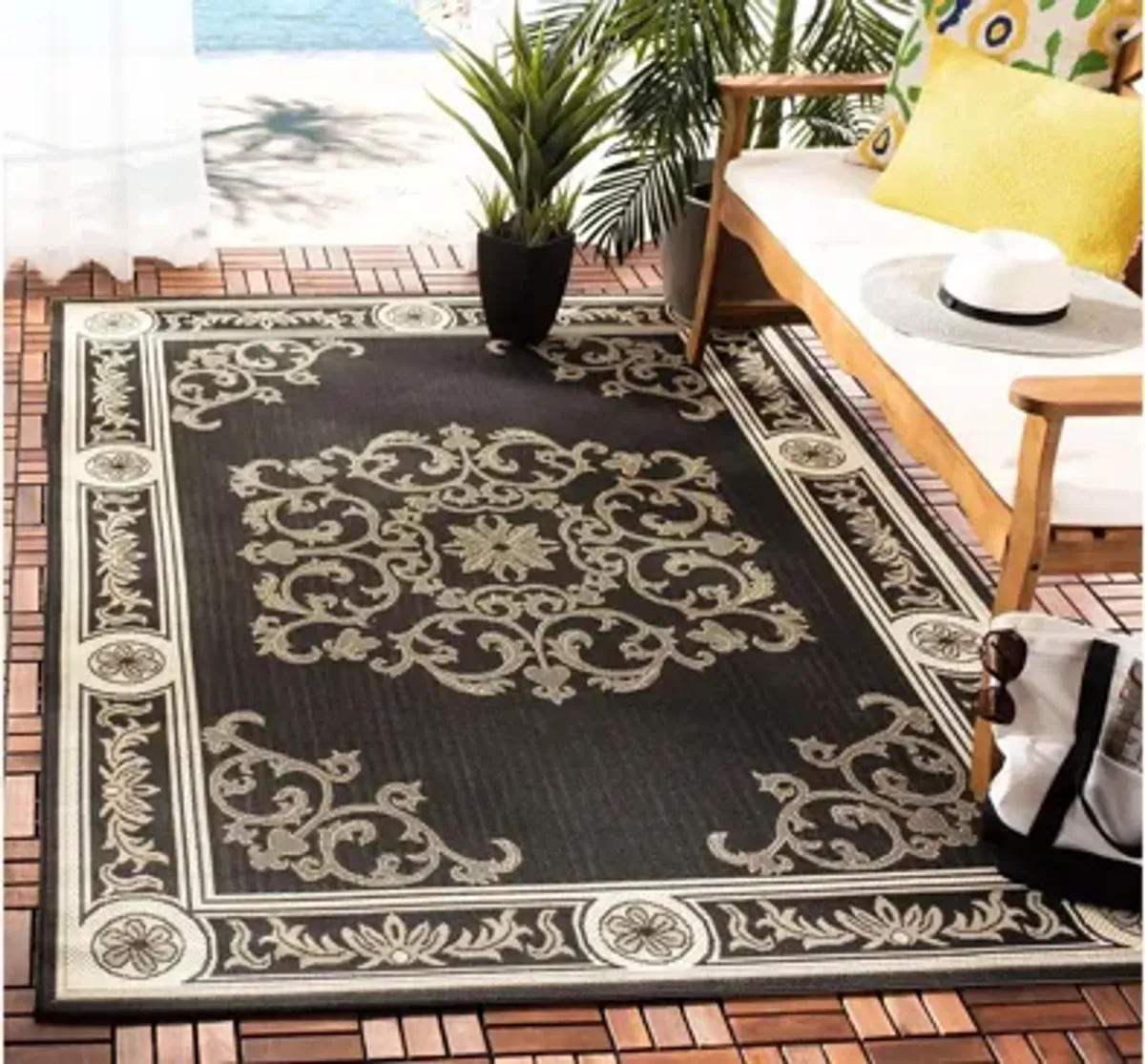 Courtyard Bordered Indoor/Outdoor Area Rug