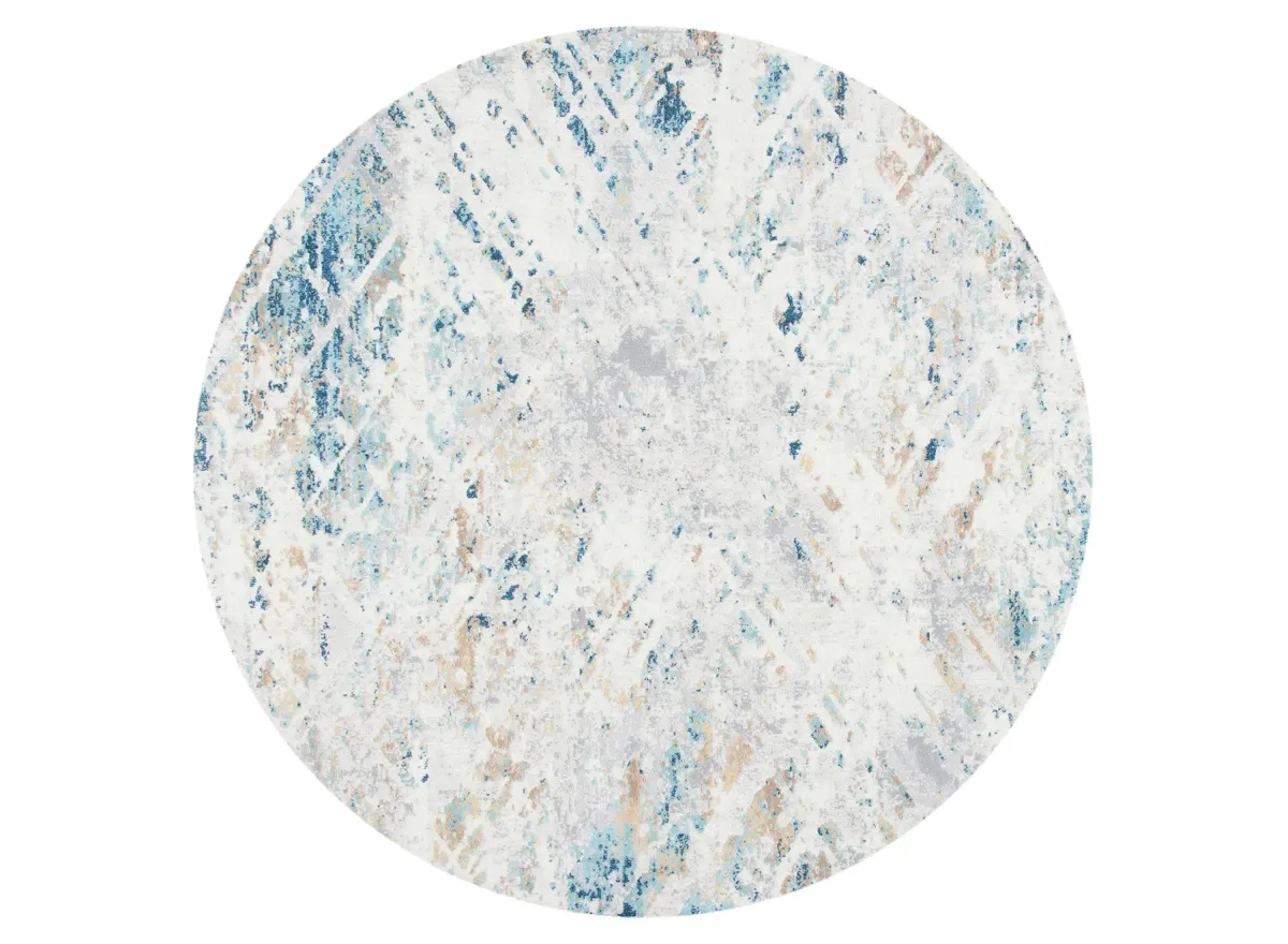 Archibald Area Rug in Ivory / Blue by Safavieh