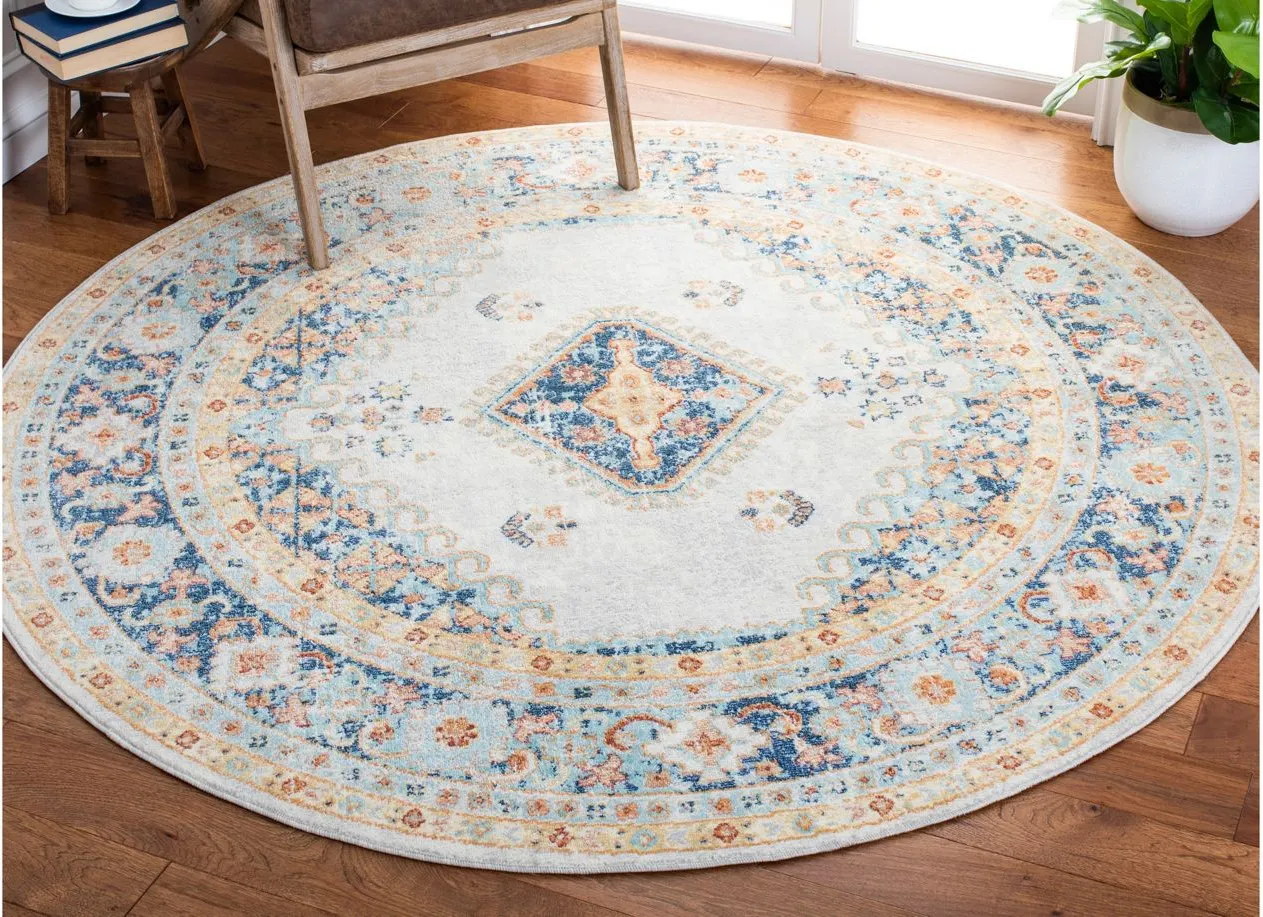 Audrianna Area Rug in Ivory / Navy by Safavieh