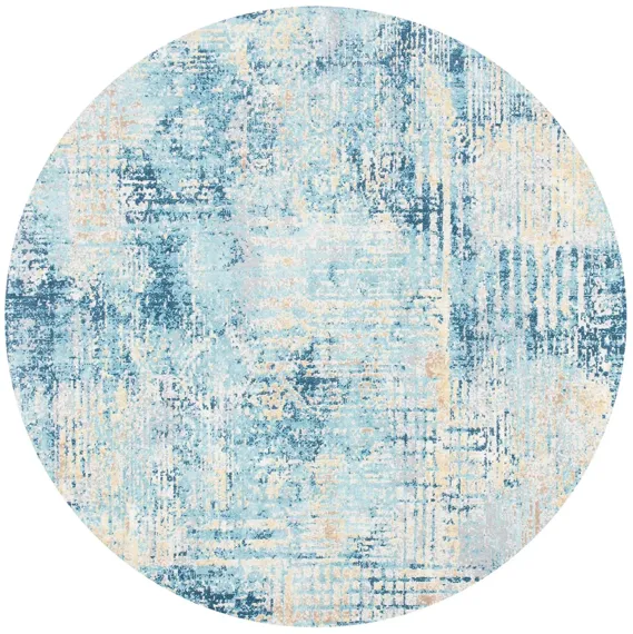 Ammon Area Rug in Ivory / Blue by Safavieh