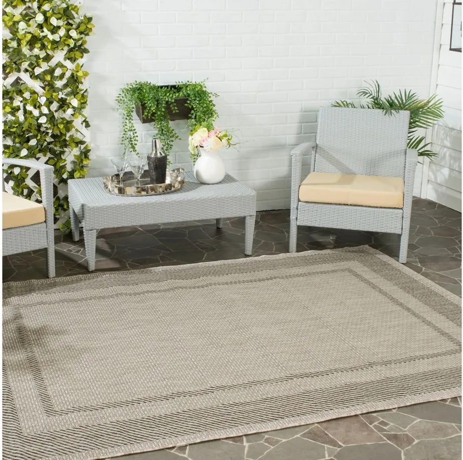 Courtyard Edging Indoor/Outdoor Area Rug in Beige & Black by Safavieh