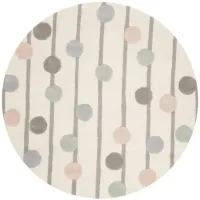 Rory Kid's Area Rug in Ivory & Multi by Safavieh