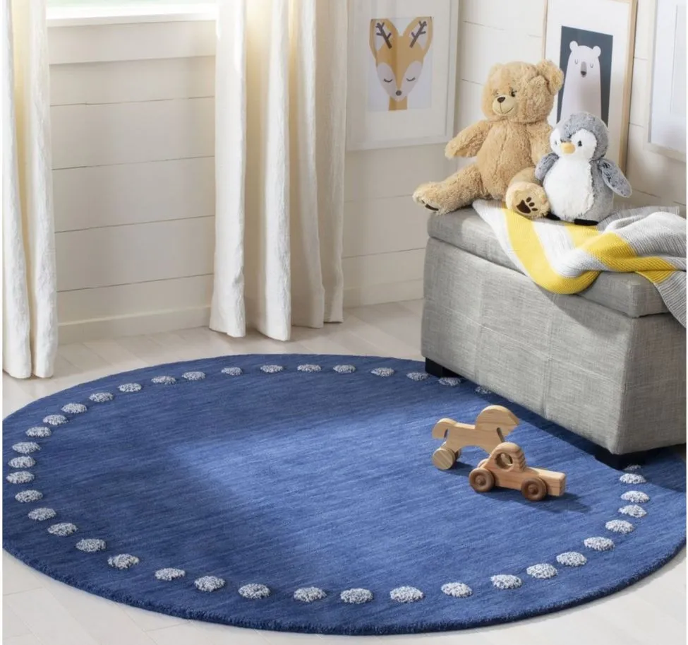 Finnian Kid's Area Rug in Navy by Safavieh