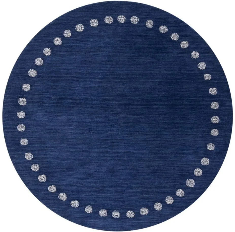 Finnian Kid's Area Rug in Navy by Safavieh