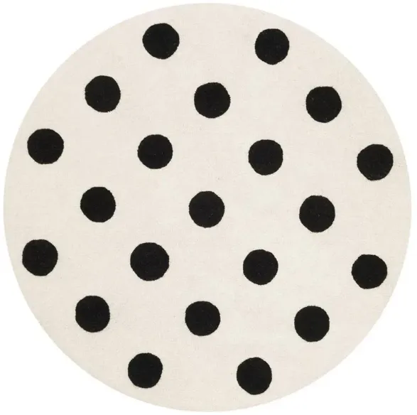 Cairo Kid's Area Rug in Ivory & Black by Safavieh