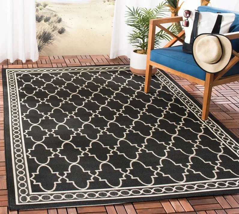 Courtyard Trellis Indoor/Outdoor Area Rug in Black & Beige by Safavieh