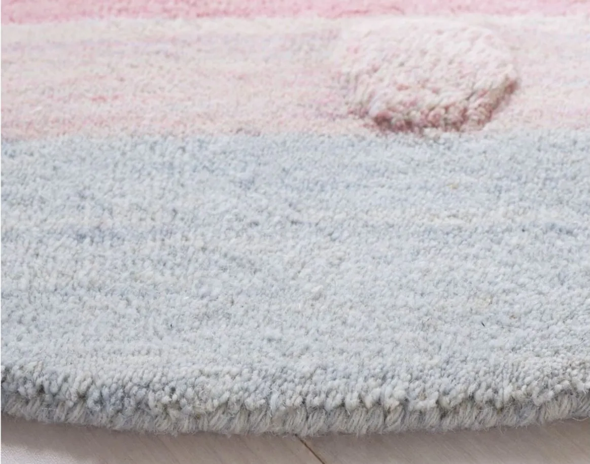 Glenna Kid's Area Rug in Light Blue & Pink by Safavieh