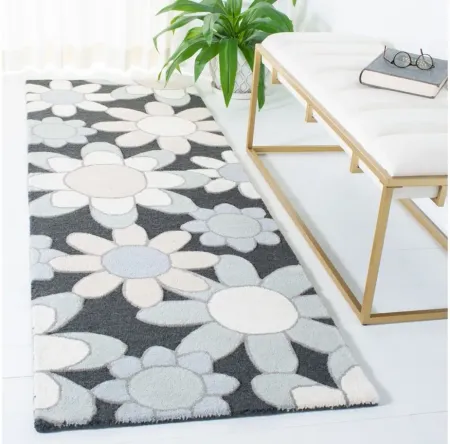 Talya Kid's Area Rug in Charcoal/Ivory by Safavieh