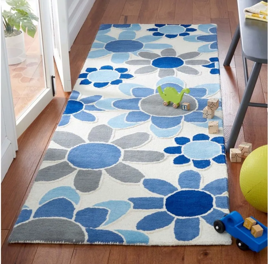 Talya Kid's Area Rug in Ivory/Blue by Safavieh