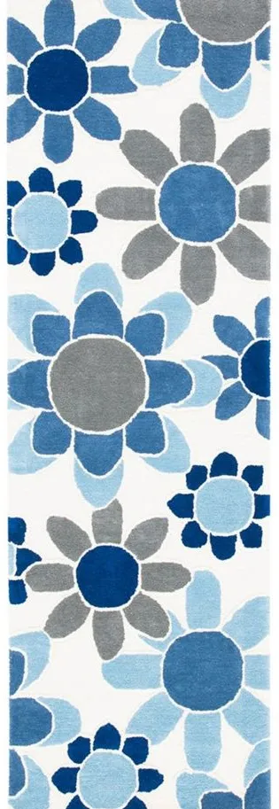 Talya Kid's Area Rug in Ivory/Blue by Safavieh