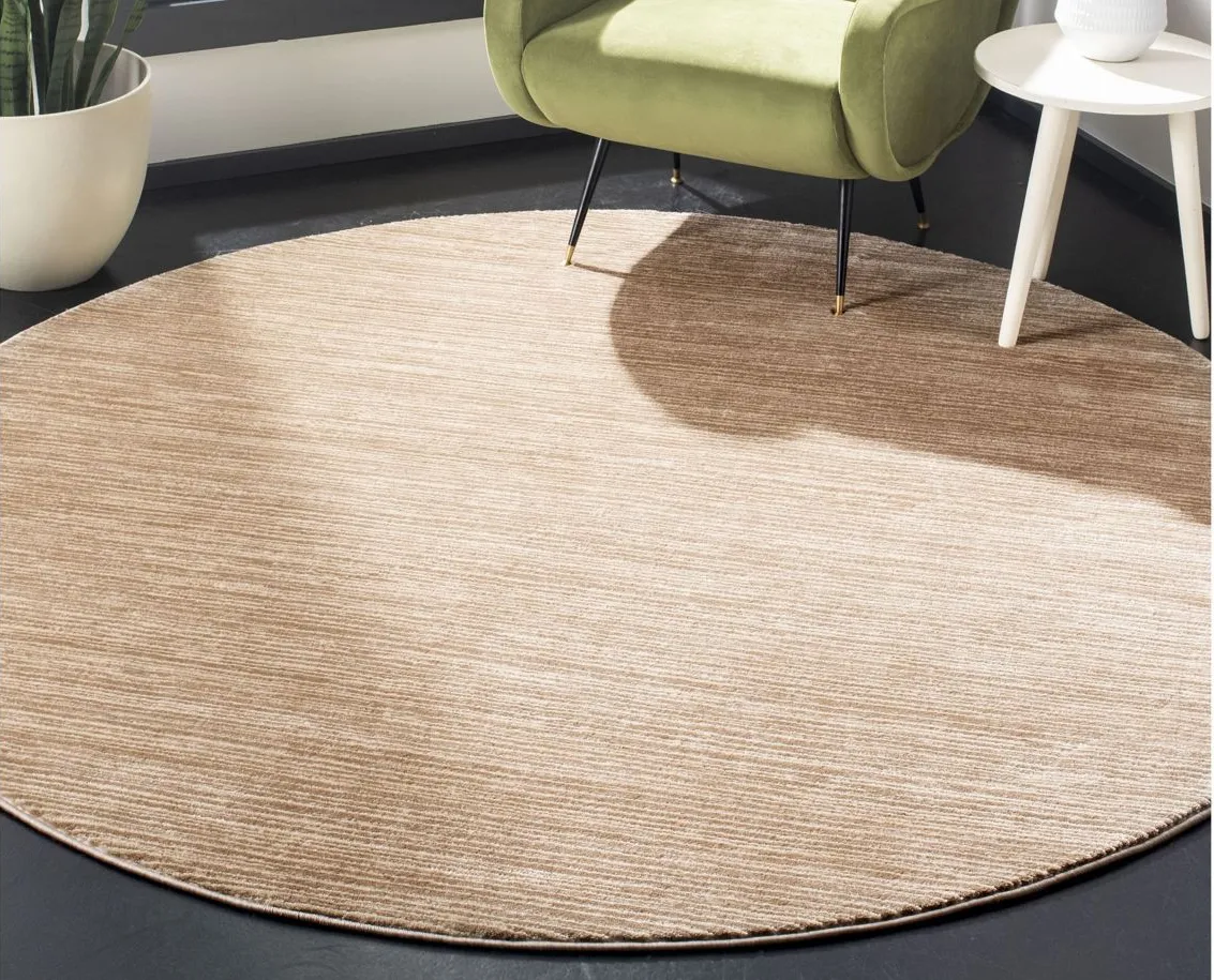 Hoechlin Round Area Rug in Light Brown by Safavieh