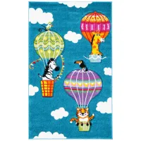 Carousel Balloons Kids Area Rug in Blue & Green by Safavieh
