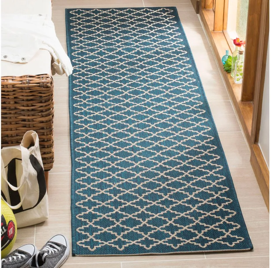 Courtyard Link Indoor/Outdoor Runner Rug in Navy & Beige by Safavieh