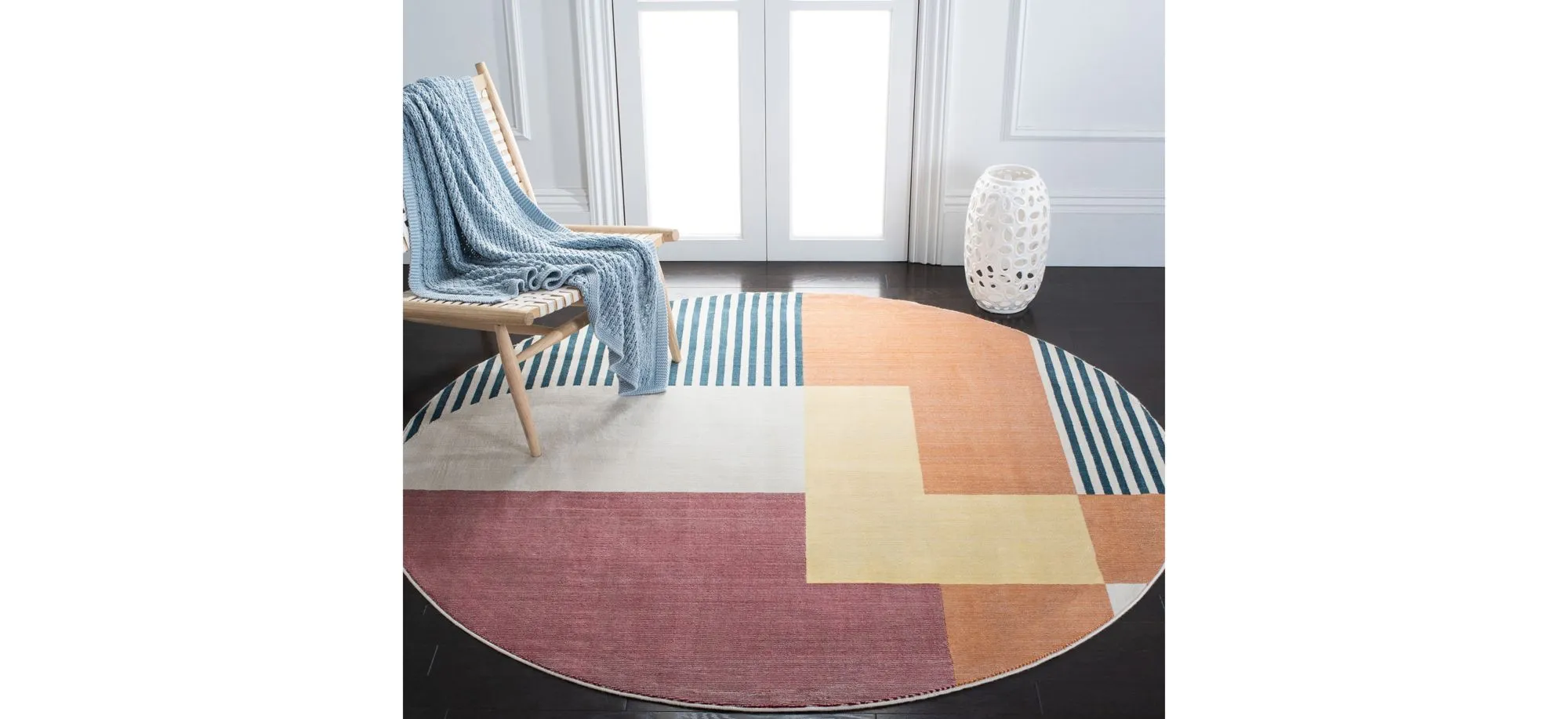 Olli Round Area Rug in Rust/Yellow by Safavieh