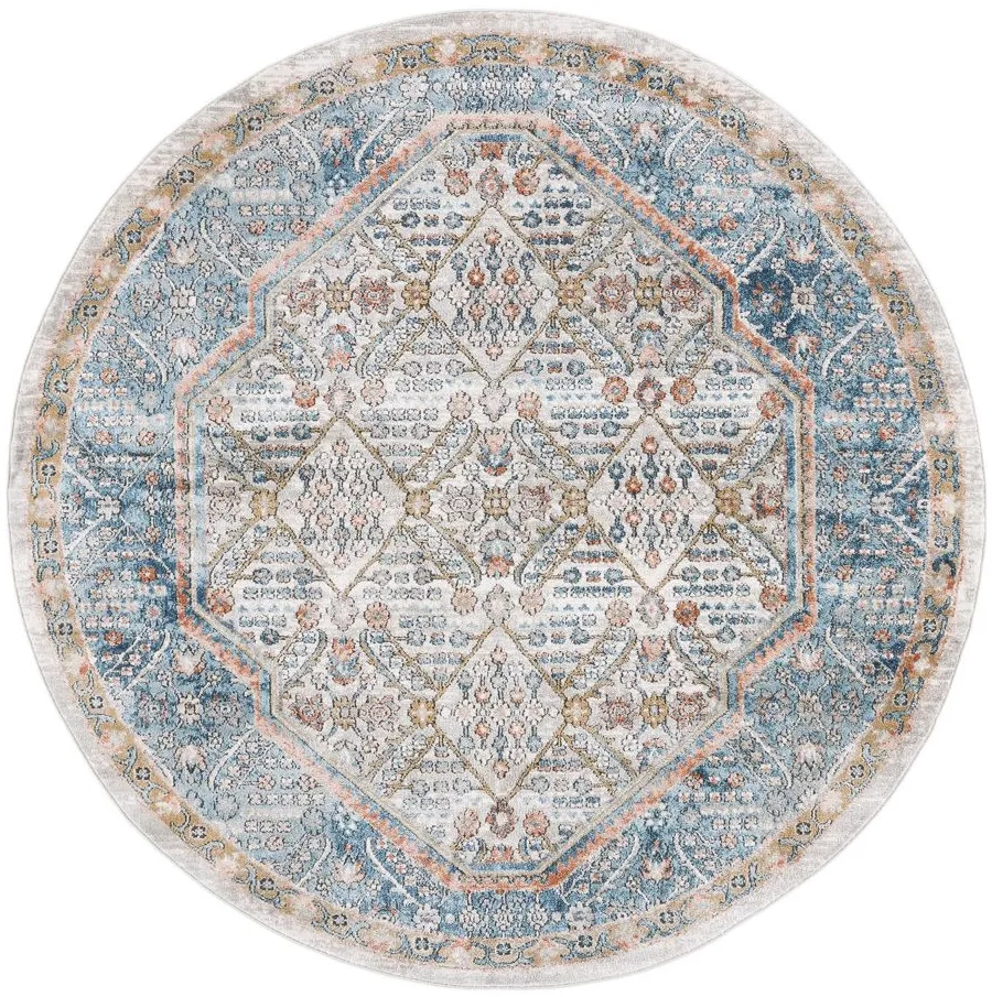 Shivan Area Rug in Blue / Red by Safavieh