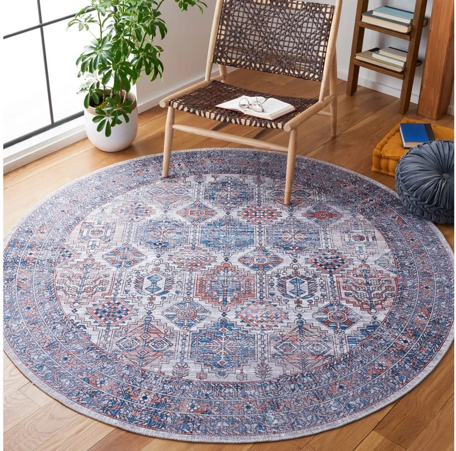 Serapi Area Rug in Blue & Rust by Safavieh